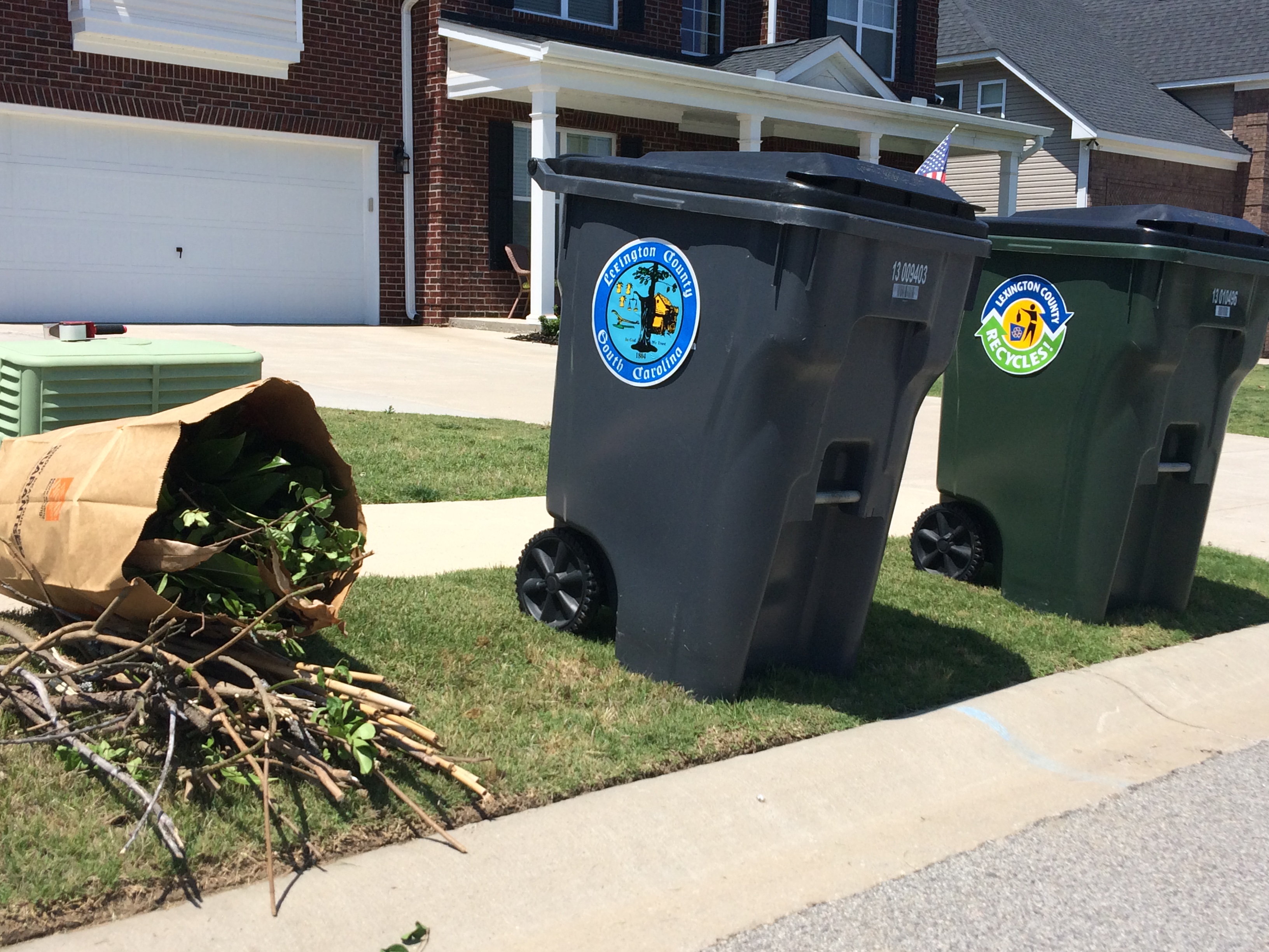 Curbside recycling and garbage containers